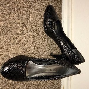 Black and silver snake like heels
